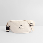Sac banane COVER YOU naturel posé de trois-quarts, sangle et boucle à clip visibles