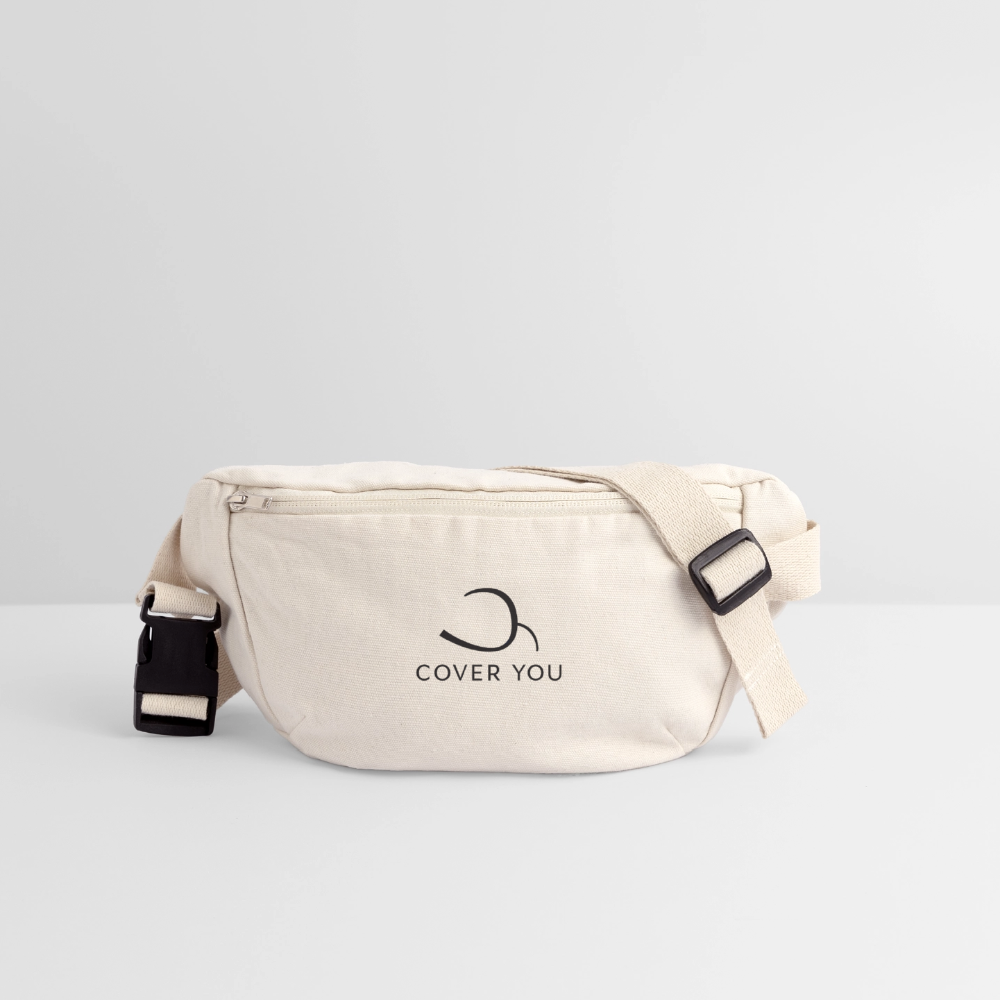 Sac banane COVER YOU naturel posé de trois-quarts, sangle et boucle à clip visibles