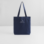 Tote bag COVER YOU bleu chiné posé sur fond clair, longues anses relevées
